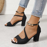 Zwarte sandalen met blokhak en open teen
