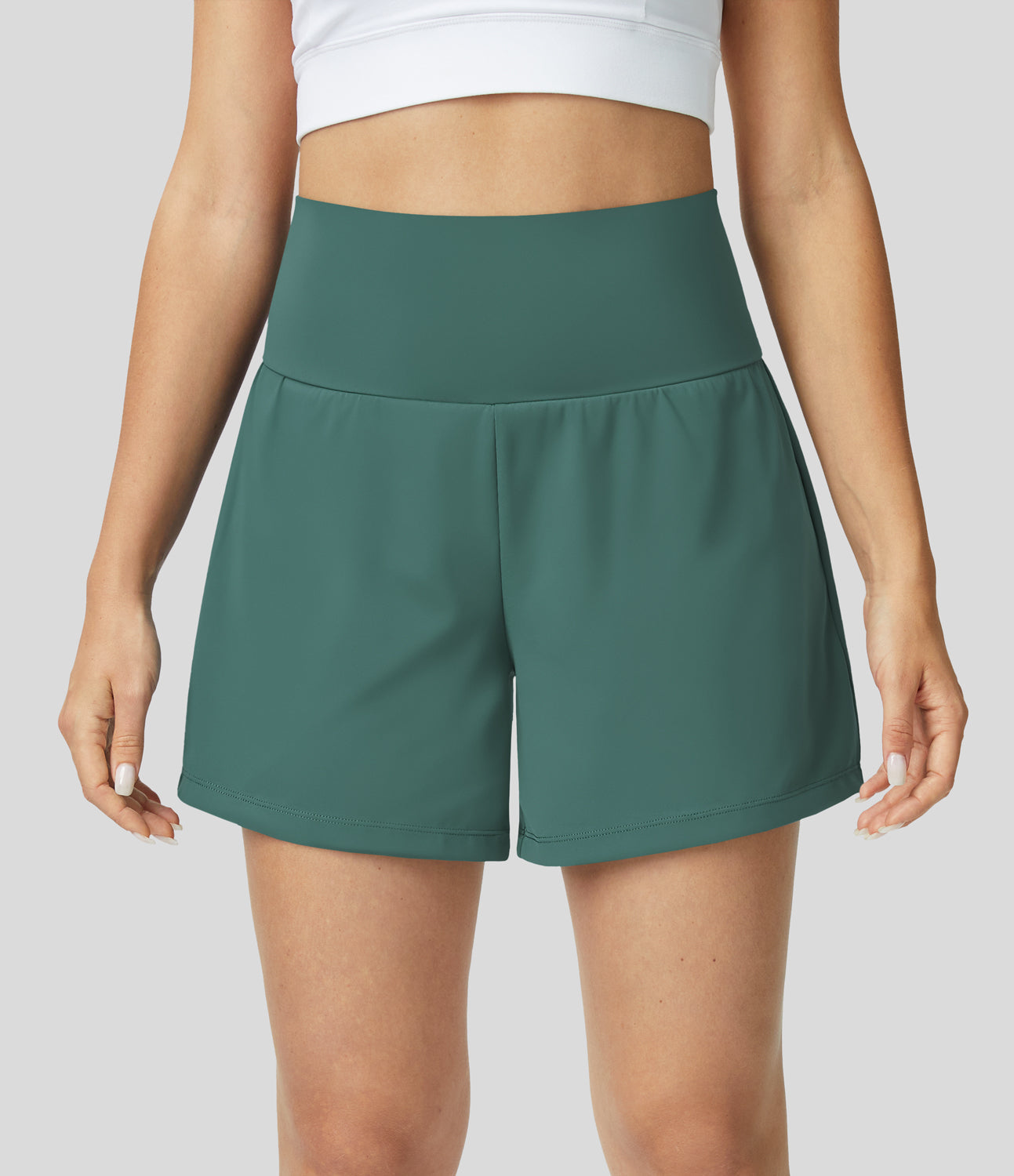 Neréa Shorts Oliv Damen – elastische Fitness Shorts
