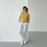 Yúmei Track Jacket | Retro-Sportjacke mit Knopfdetails mit Schlaufen