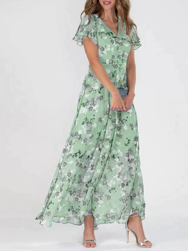 Elegantes Midi-Kleid in Grün mit Blumenprint – Ganzkörperaufnahme