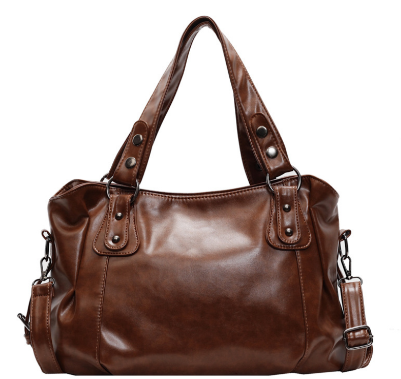 Braune Velmira Vintage Tasche von Talaine elegant kombiniert