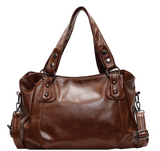 Braune Velmira Vintage Tasche von Talaine elegant kombiniert