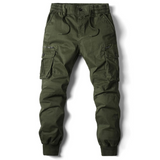 groen cargo jogger met elastische tailleband en boorden aan de enkels.
