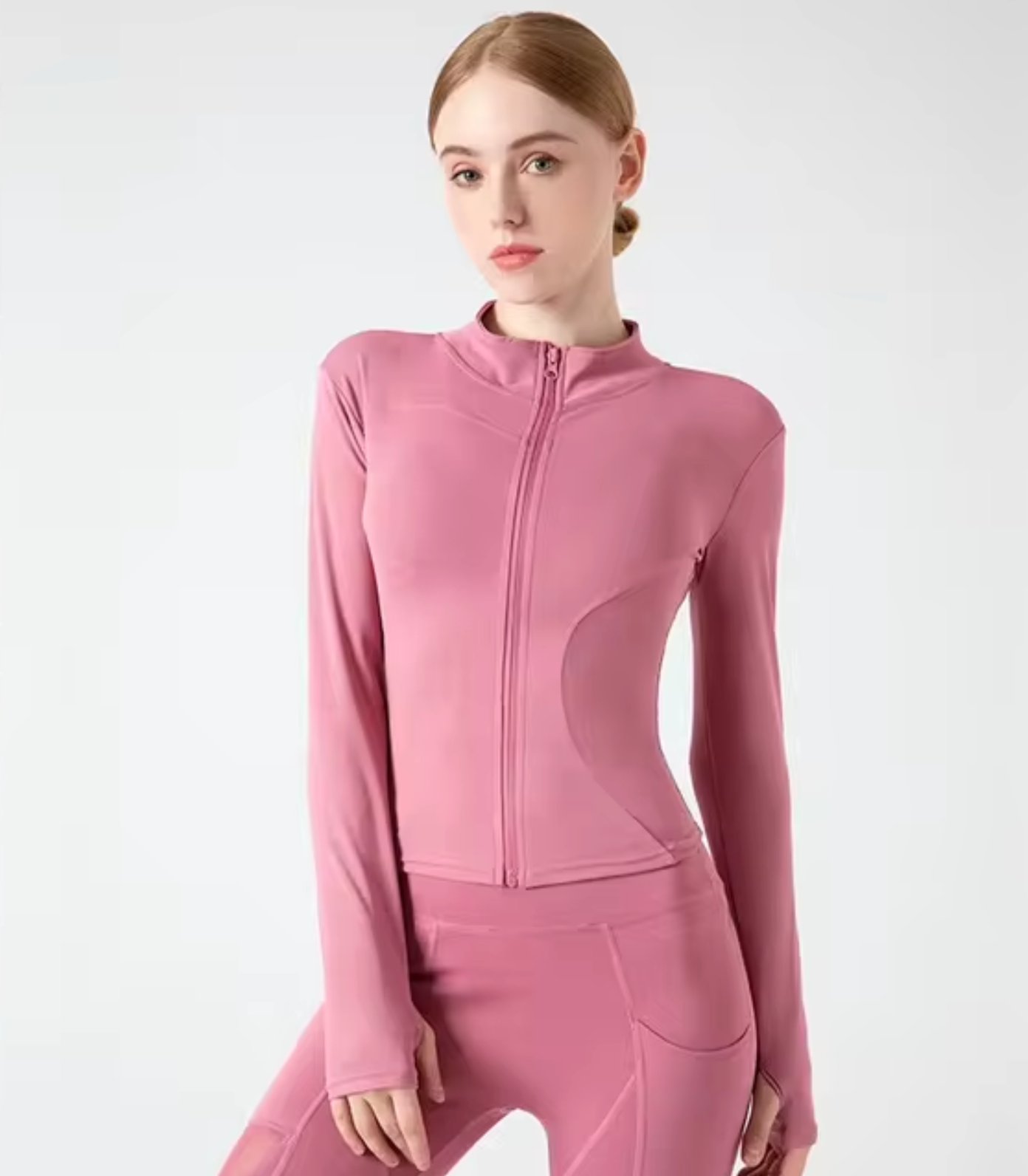 Rosa Damen Sportjacke, eng anliegend mit Reißverschluss
