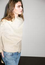 Damen Outfit mit Aveline Mantel und eleganten Accessoires