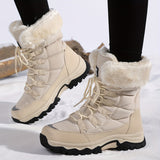 Beige damen winterstiefel mit fellkragen und schwarzer profilsohle
