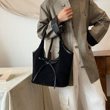 Bella Charm Bag in zwart vegan suède en leer met strikdetail