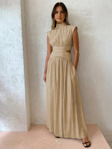 Model in beige mock neck maxi dress
