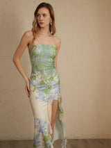 Mouwloze midi bloemenjurk met split
