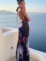 maxi jurk met print en rugloze halter
