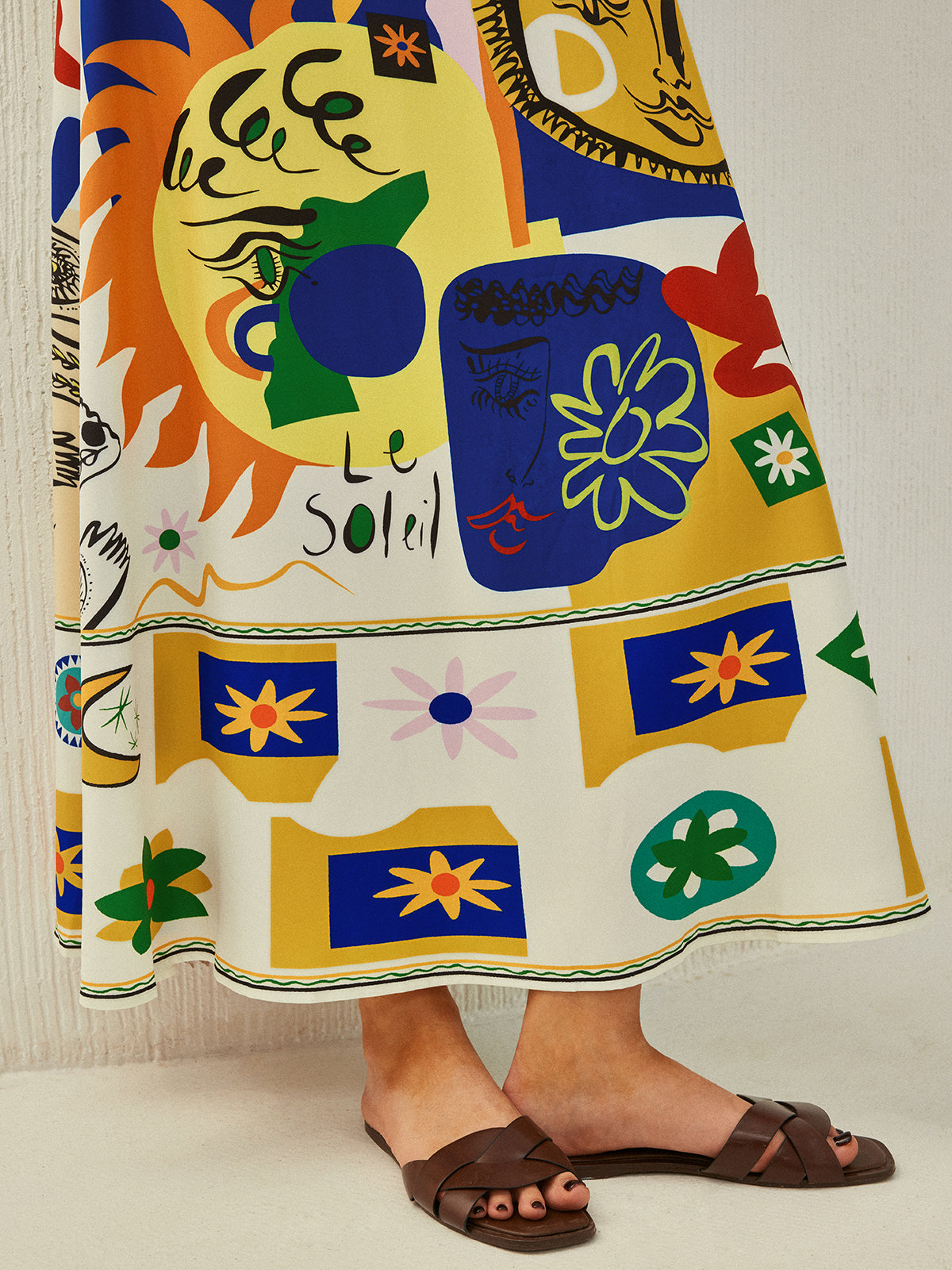 zomerse jurk met dunne bandjes en print
