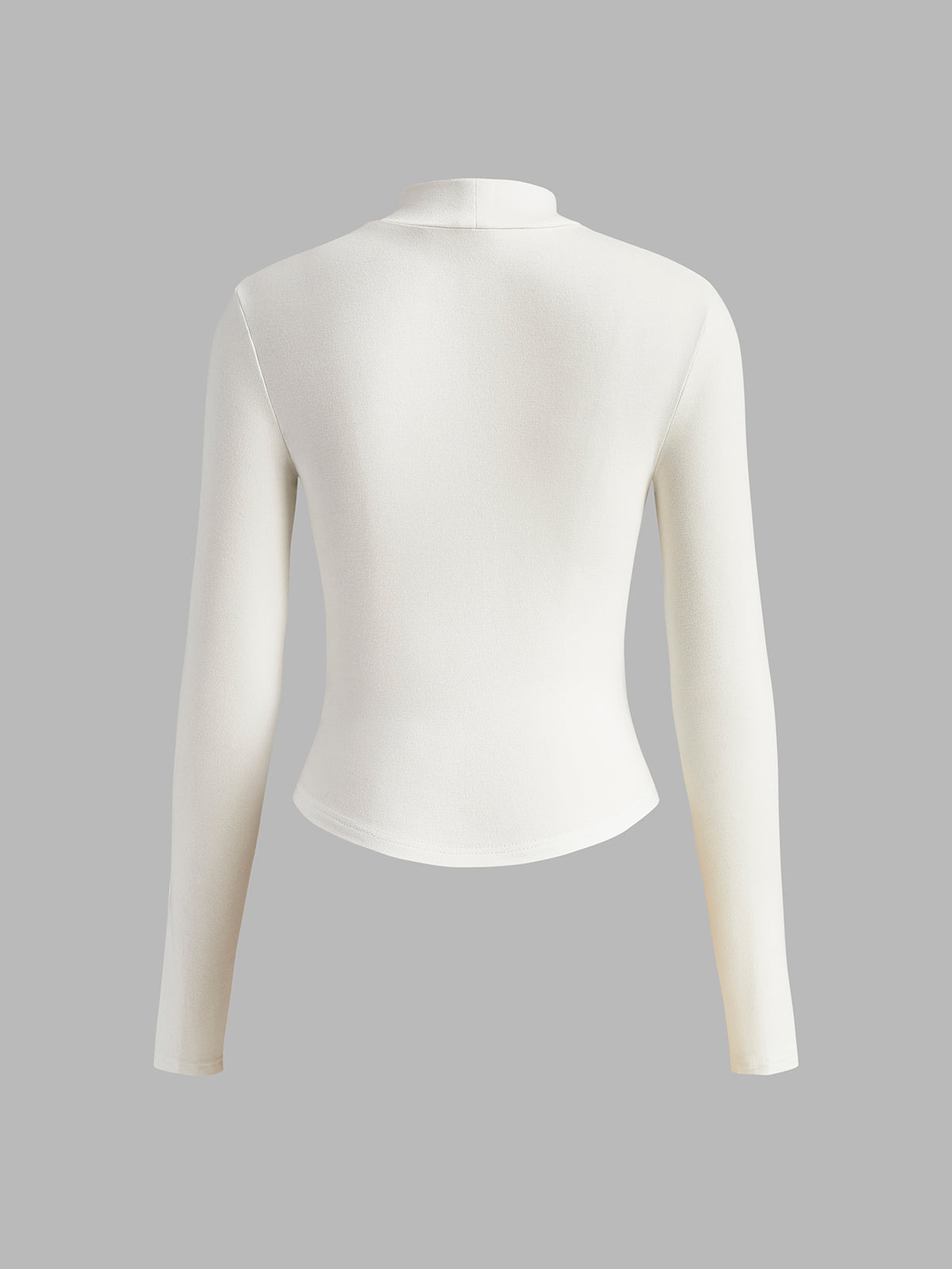 Achterzijde van witte Meliora top
