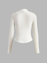 Achterzijde van witte Meliora top
