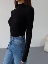 Meliora | Mock Neck Ribbed Top with Piping Detail