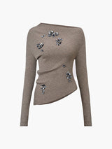 Mirabel asymmetrisches Strick-Top in Khaki mit schrägem Ausschnitt und silbernen Paillettenblüten