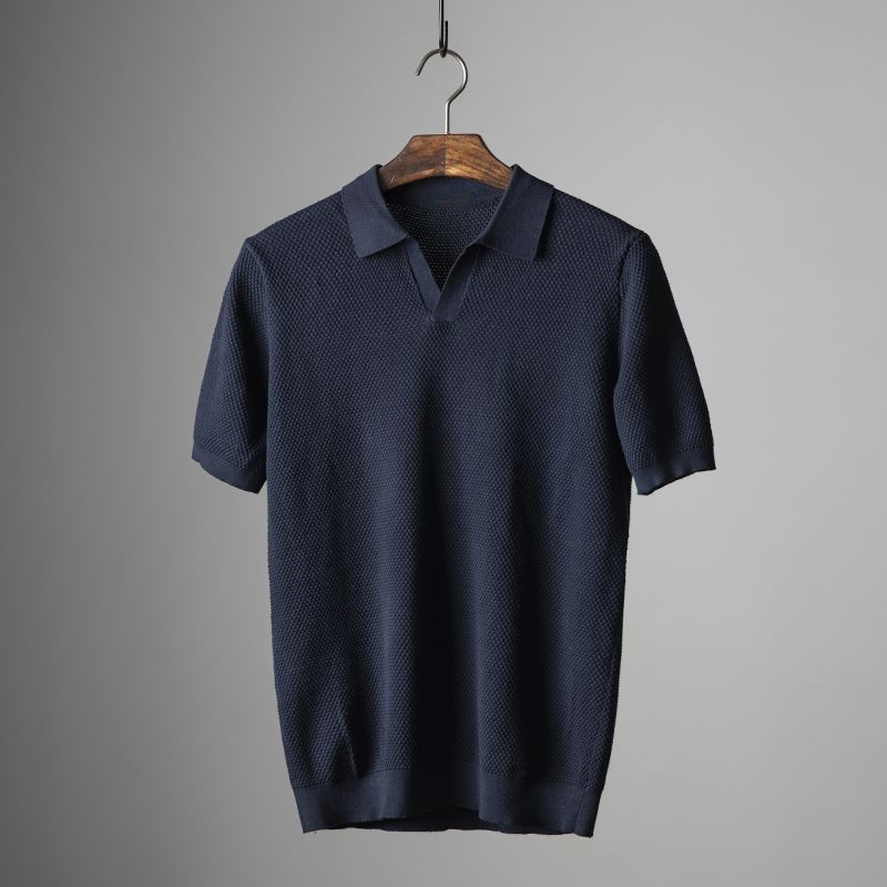 Aksel polo in donkerblauw aan hanger
