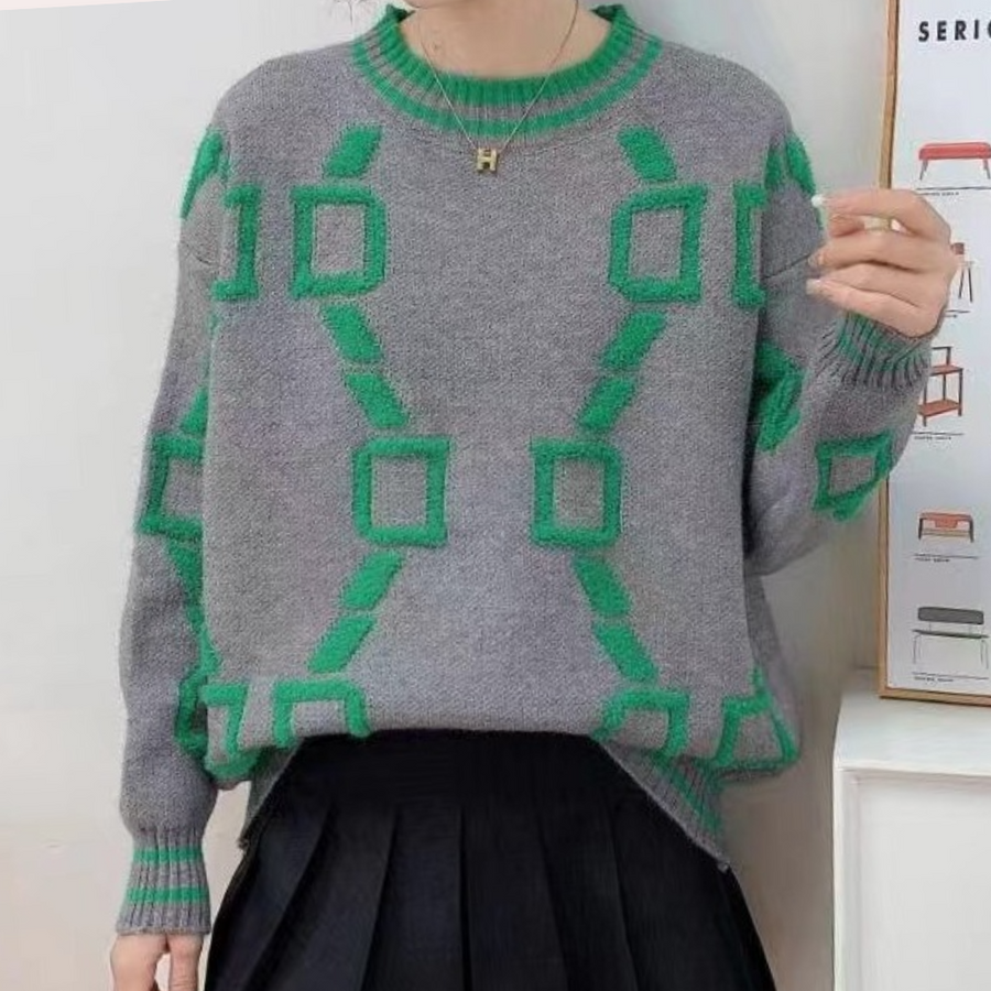 Alice Trui voor dames met geometrische print, verkrijgbaar in grijs, roze en wit. Comfortabele en stijlvolle trui.
