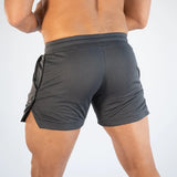 grijze gym short met elastische tailleband en trekkoord
