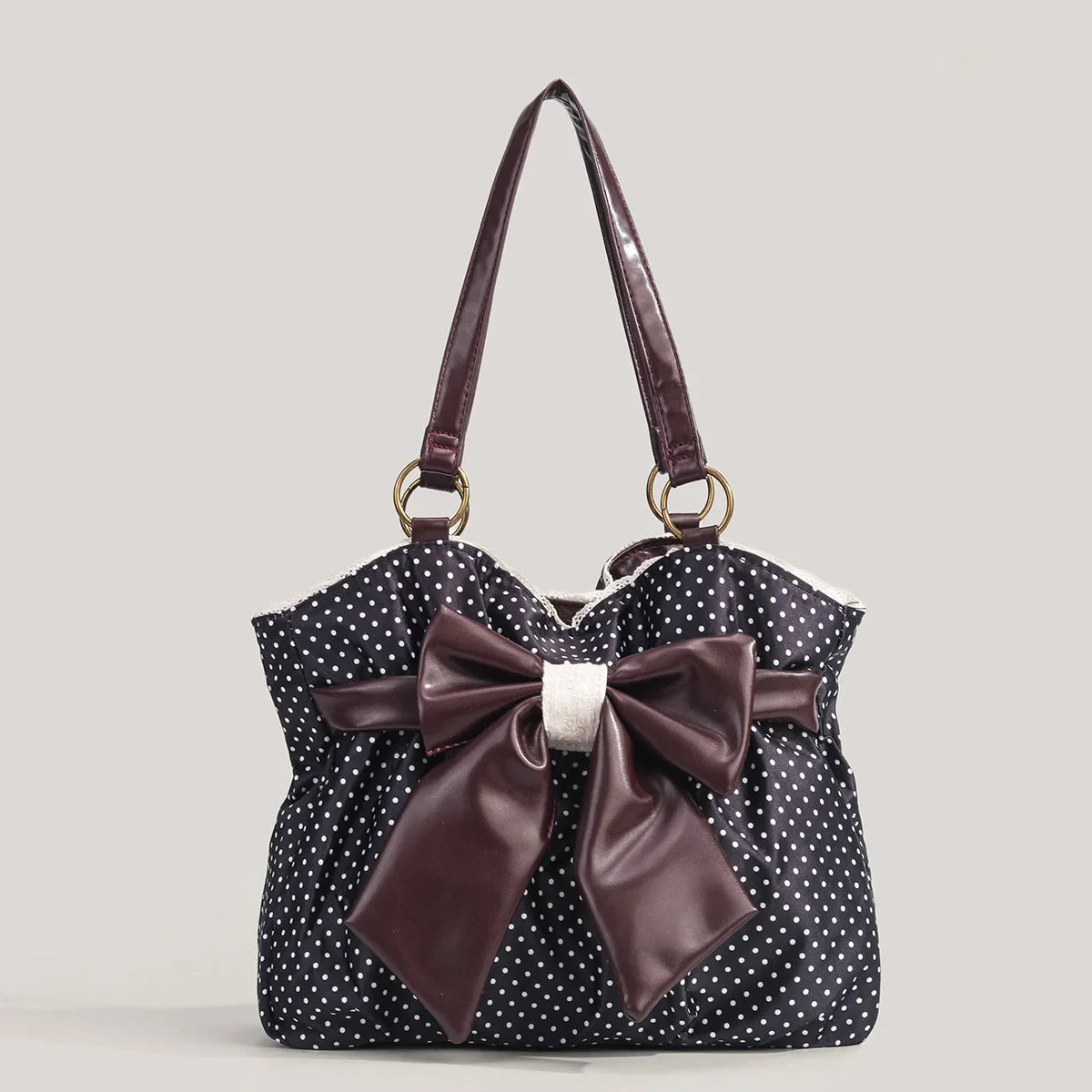 Rosalie Polkadot Schultertasche mit großer Schleife in Schwarz
