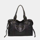 zwarte vintage schoudertas van PU leer met metalen details en dubbele handgrepen
