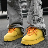 Zijkant van de Agostina Sneakers met stevige rubberen zool.