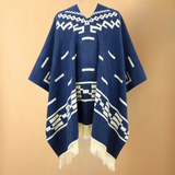 blauwe herenponcho voor winterlook
