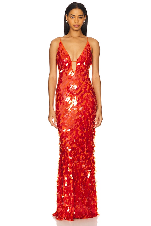 frau in rotem pailletten abendkleid mit v-ausschnitt