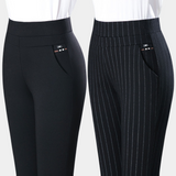 close-up van de hoge taille en elastische stof van damesbroek Lotte

