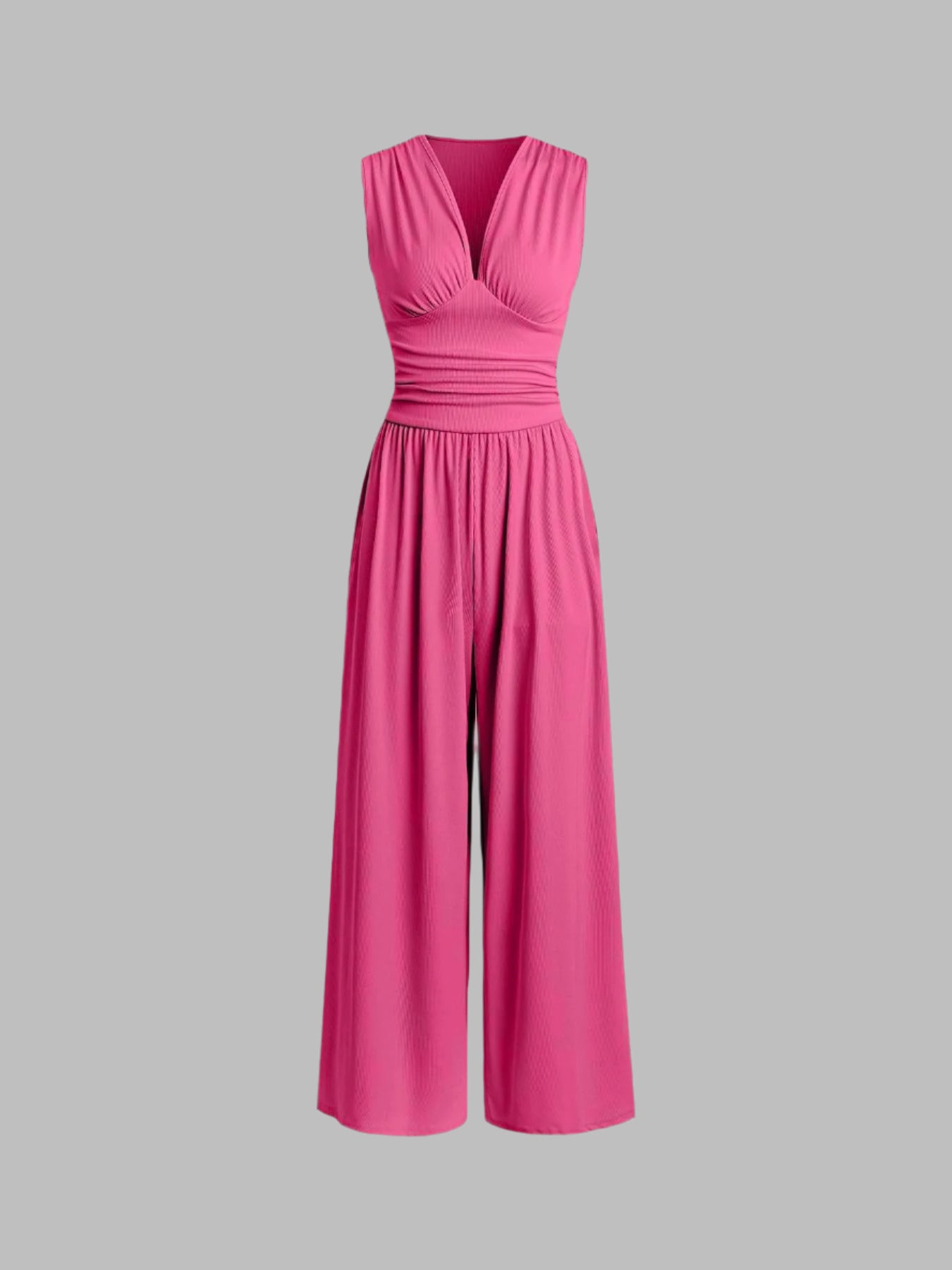 Elvara Jumpsuit in Pink ohne Modell – Flatlay-Ansicht mit V-Ausschnitt und Wide-Leg