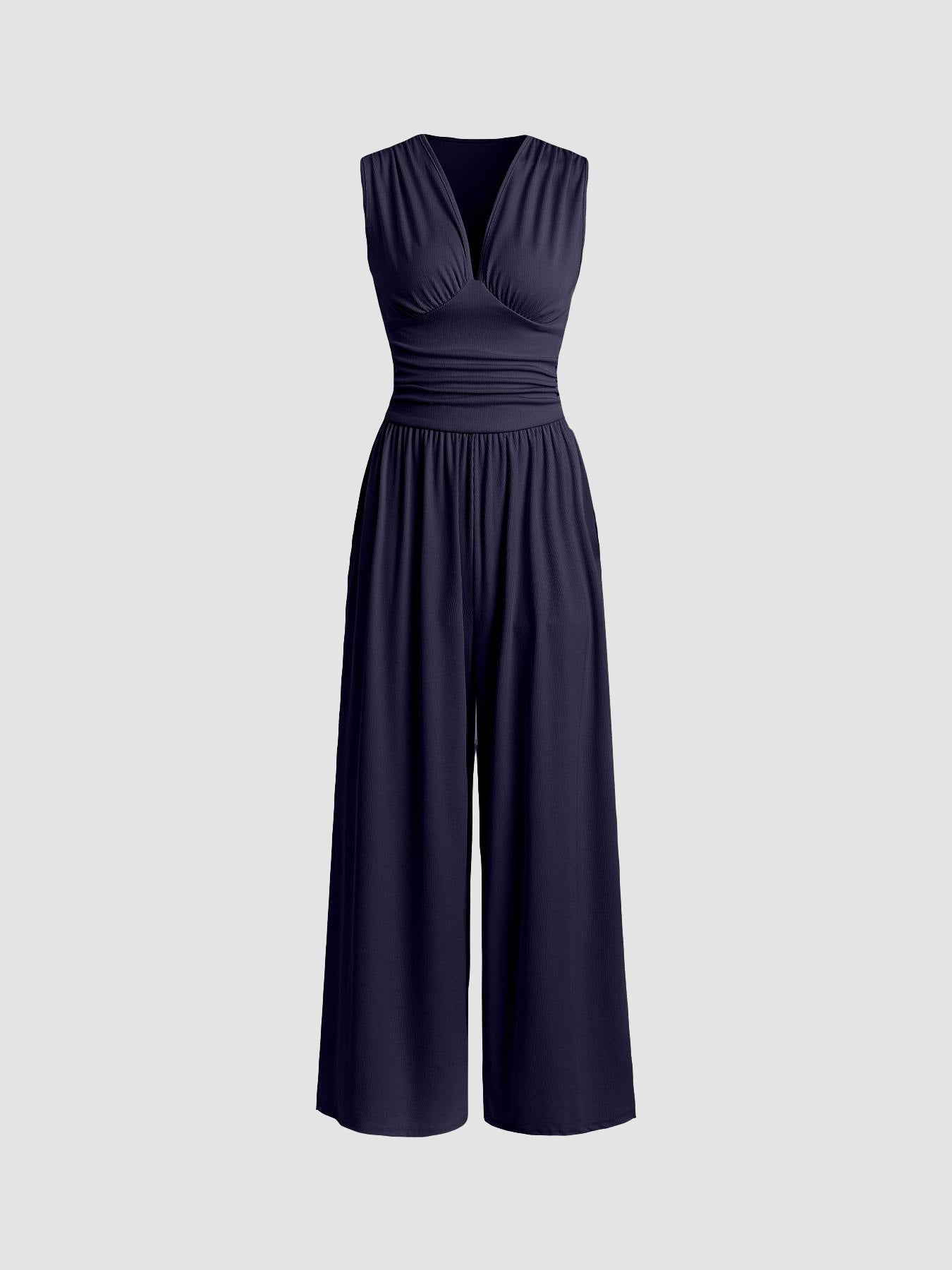 Elvara Jumpsuit in Marineblau ohne Modell – Flatlay-Ansicht mit V-Ausschnitt
