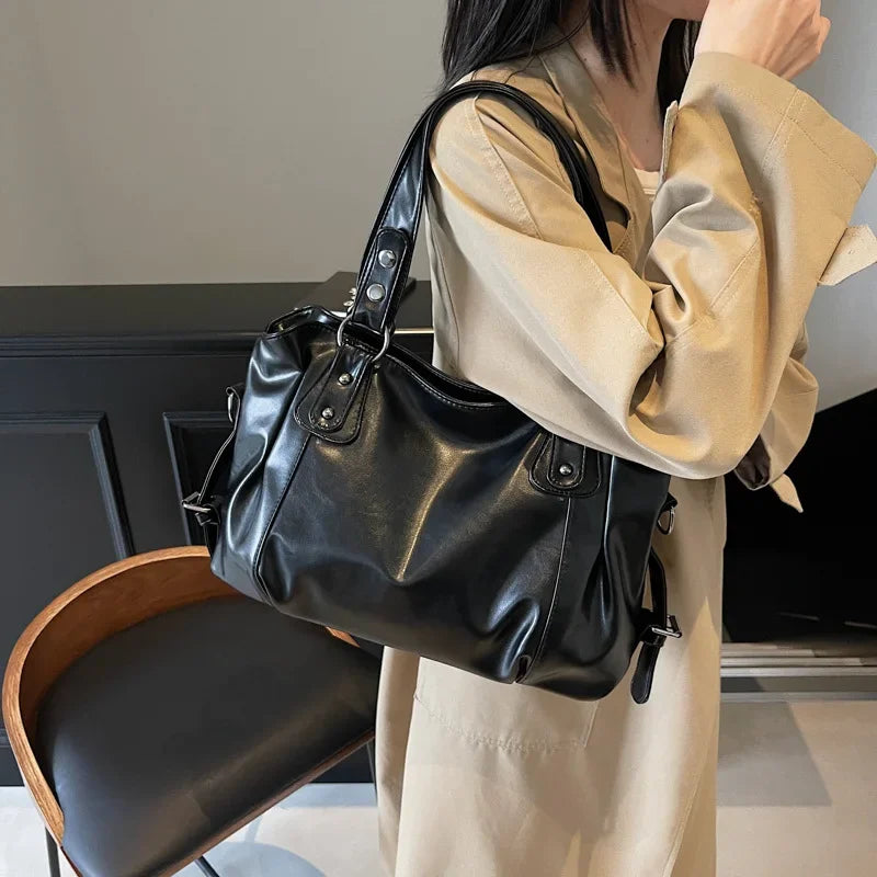 Geräumige Velmira Vintage Schultertasche von Talaine seitlich