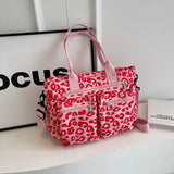 Roar Chic Tote – ruime leopardprint tas met stevige schouderbanden en meerdere ritsvakken, perfect voor dagelijks gebruik.