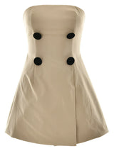 strapless beige mini jurk met zwarte knopen, elegante A-lijn mini jurk dames, chique strapless avondjurk met asymmetrische plooien, Belle Amour mini jurk modieuze look, cocktailjurk strapless beige met knopen
