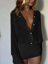 zwart dames setje met blouse en rok

