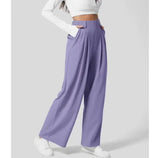 Faye Wide Leg Pantalon  in paars met hoge taille, comfortabele pasvorm en elegante wijde pijpen – ideaal voor werk en vrije tijd.