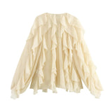 crèmekleurige romantische blouse
