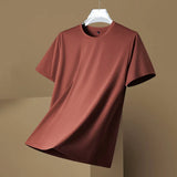 Ezra T-shirt in roestkleur op hanger
