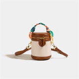 Lunetta bucket bag met bruine accenten en bruin slotje