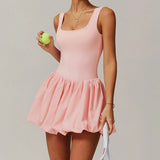 Sportlicher Damen Playsuit in Rosa mit Rock-Effekt und Shorts
