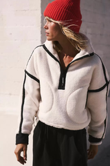 Grijze half-zip sweater met verstelbare zijkoorden, vooraanzicht.