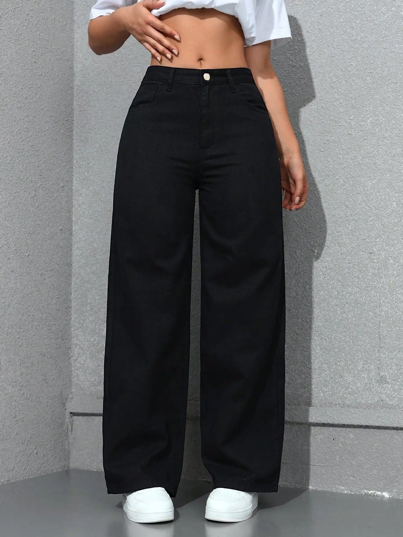 Lunira Wide-Leg-Jeans in Schwarz – Detail-Flatlay mit hohem Bund