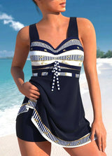 Donkerblauwe tankinijurk met wit patroon en short – flatterend en comfortabel ontwerp