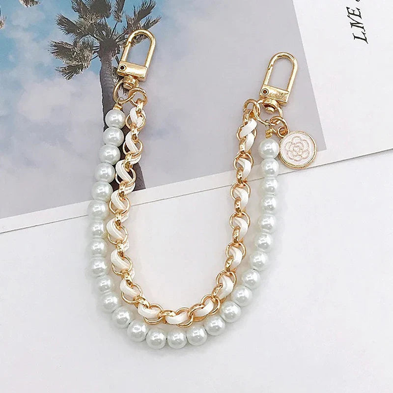 gouden ketting en parel tas hanger

