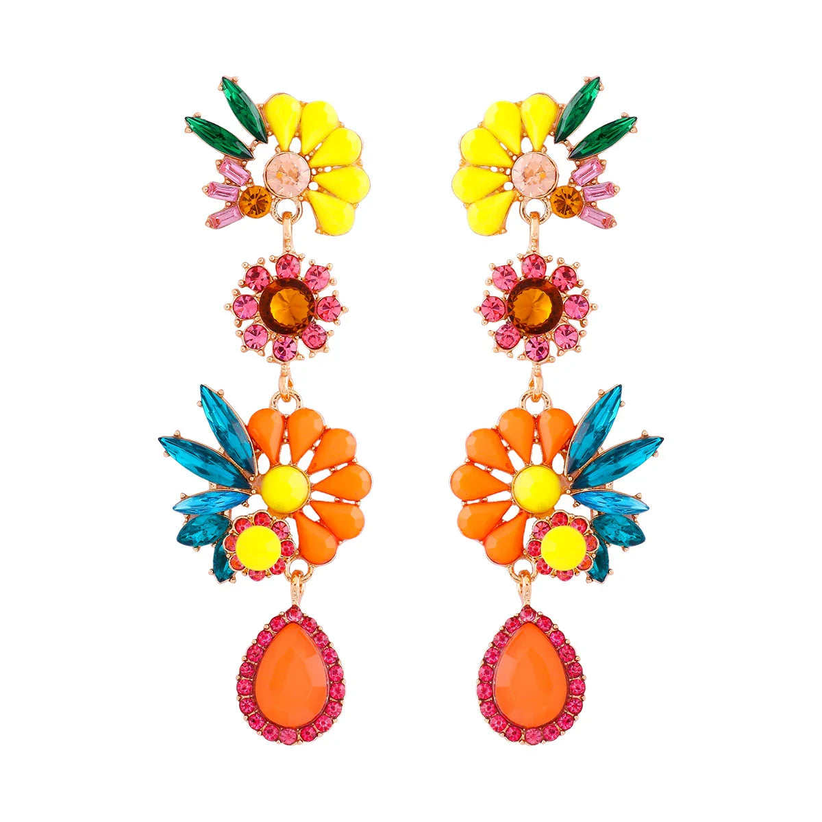 Lange Ohrringe mit tropischen Blüten und funkelnden Steinen
