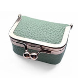 groene miniportemonnee van leer met retro kliksluiting