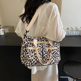 Roar Chic Tote – ruime leopardprint tas met stevige schouderbanden en meerdere ritsvakken, perfect voor dagelijks gebruik.
