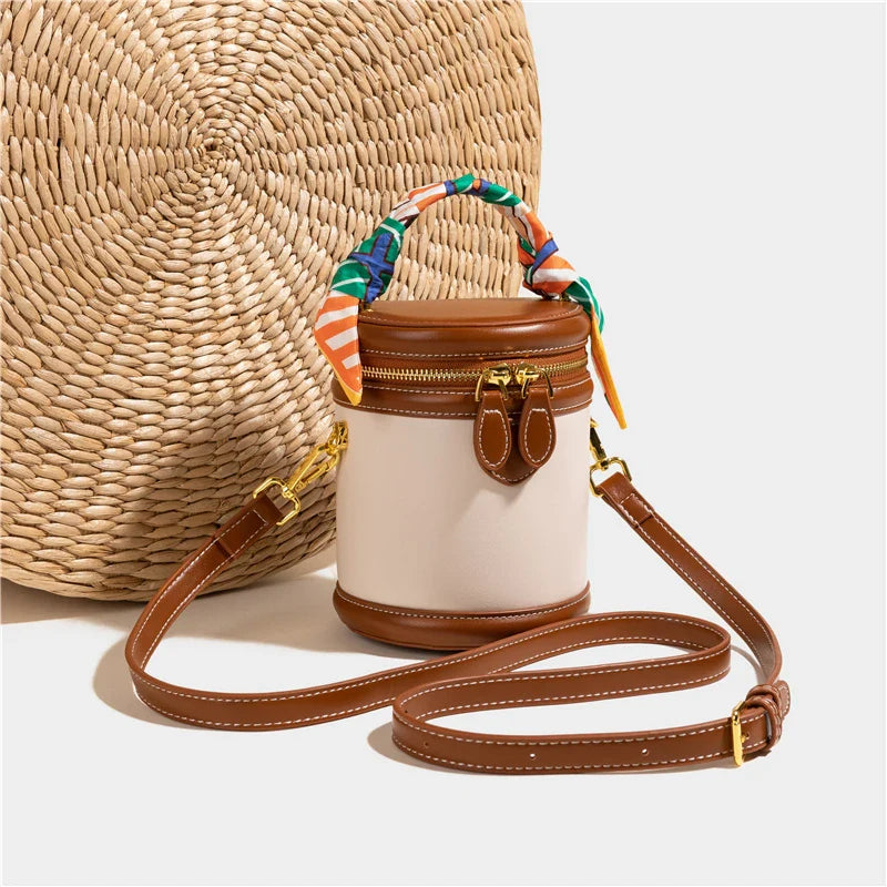 Lunetta bucket bag met bruine accenten en bruin slotje