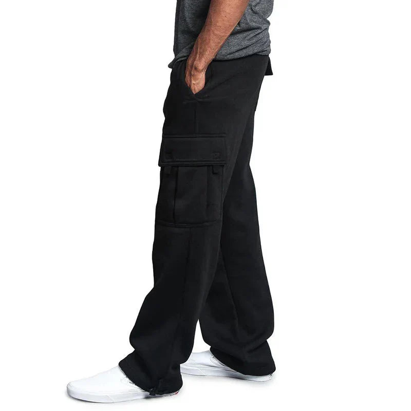 Donkergrijze trendy cargo broek met verstelbare enkels.