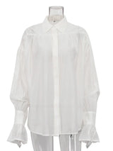 Witte oversized blouse met ballonmouwen en diepe V-hals