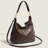 bruine leren hobo tas met vintage uitstraling en soepele structuur
